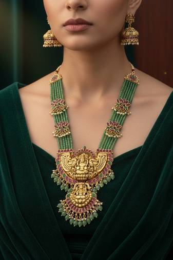 Traditional lakshmi temple long haram necklace set for women | gold-plated pearl, ruby & green stone bridal jewellery