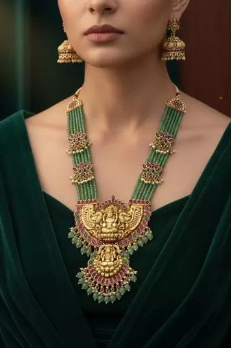 Traditional lakshmi temple long haram necklace set for women | gold-plated pearl, ruby & green stone bridal jewellery