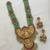 Traditional lakshmi temple long haram necklace set for women | gold-plated pearl, ruby & green stone bridal jewellery