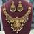 Antique gold-plated lakshmi temple necklace set with pearls & ruby green stones for women