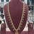 Antique gold-plated lakshmi temple necklace set with pearls & green stones for women