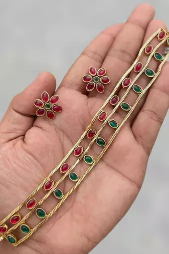 Elegant gold-plated ruby & emerald choker with floral stud earrings | traditional ethnic jewelry set