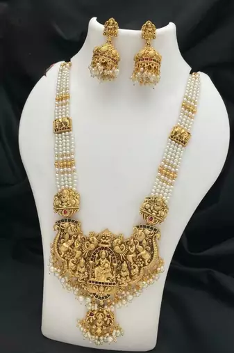 Antique gold-plated temple lakshmi haram necklace set with white beads & jhumka earrings