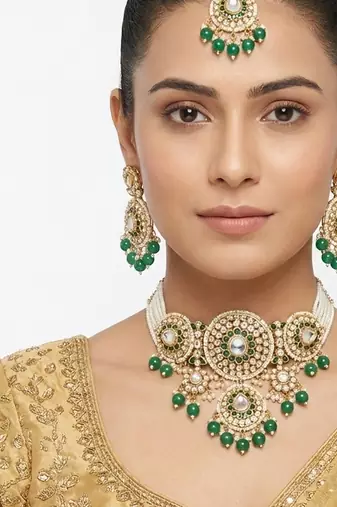 Green kundan & pearl choker set: handcrafted gold-plated indian bridal jewelry with maang tikka