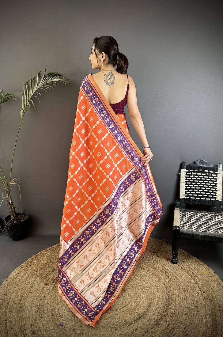 orange banarasi silk blend nature motifs zari weaving patola saree