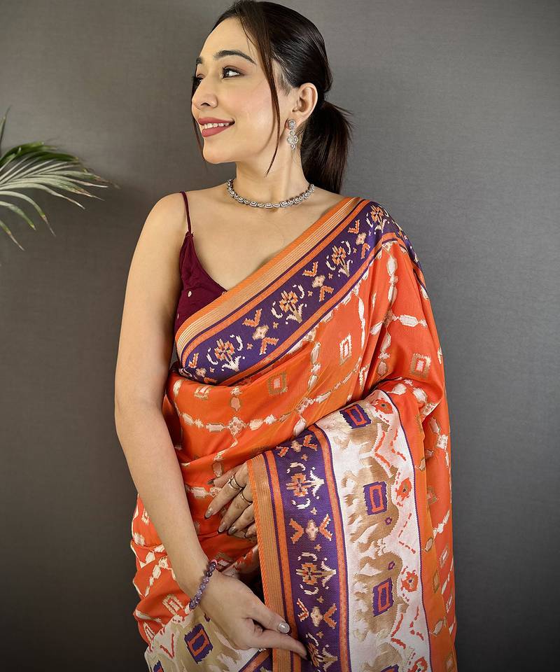 orange banarasi silk blend nature motifs zari weaving patola saree
