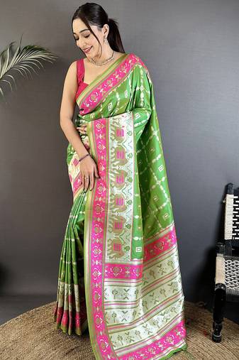 parrot green banarasi silk blend nature motifs zari weaving patola saree