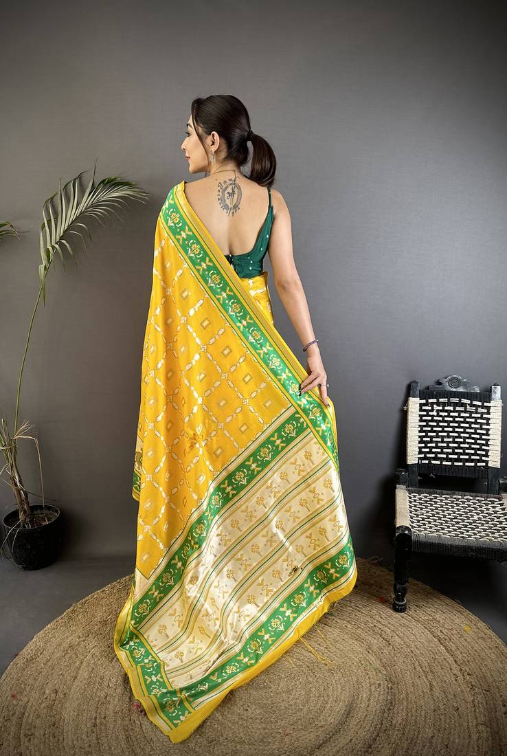 yellow banarasi silk blend nature motifs zari weaving patola saree