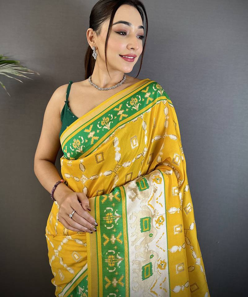 yellow banarasi silk blend nature motifs zari weaving patola saree
