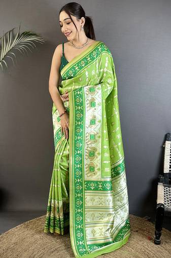 pear green banarasi silk blend nature motifs zari weaving patola saree