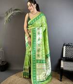 pear green banarasi silk blend nature motifs zari weaving patola saree