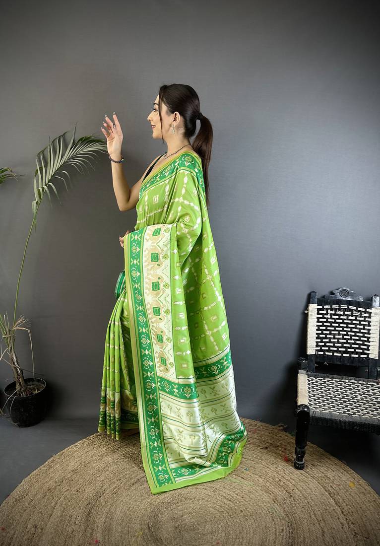 pear green banarasi silk blend nature motifs zari weaving patola saree
