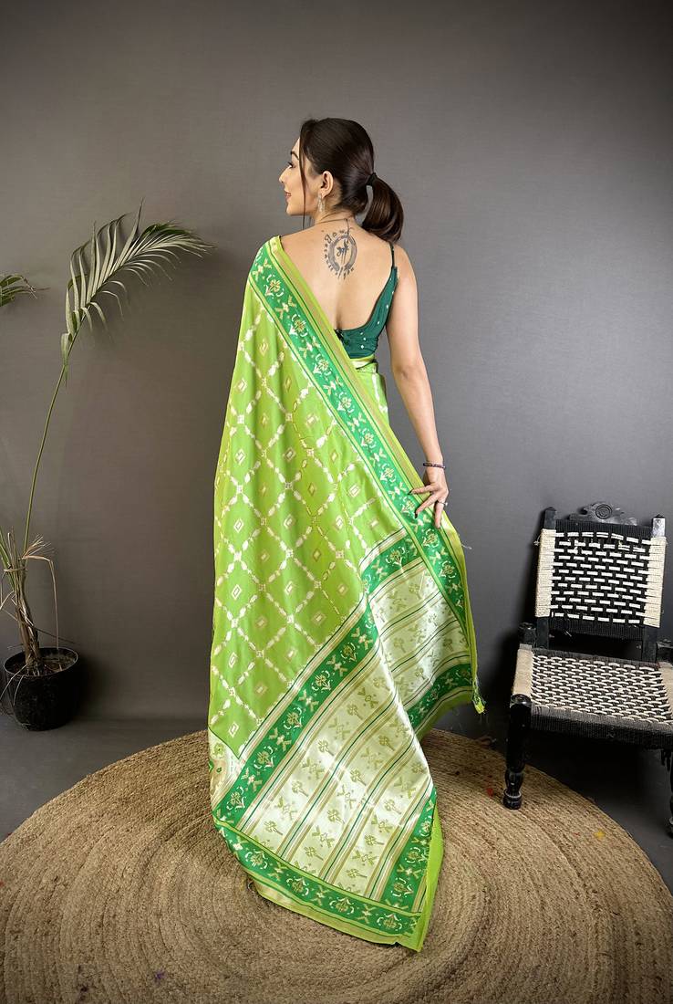 pear green banarasi silk blend nature motifs zari weaving patola saree