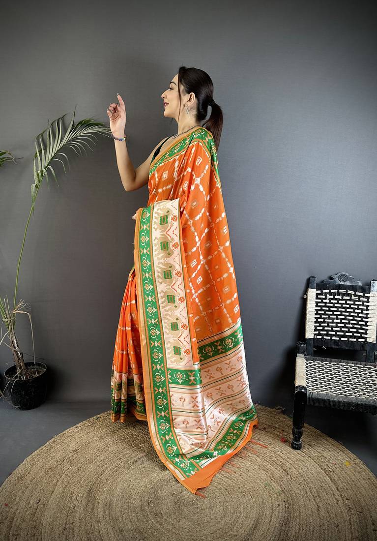 orange banarasi silk blend nature motifs zari weaving patola saree