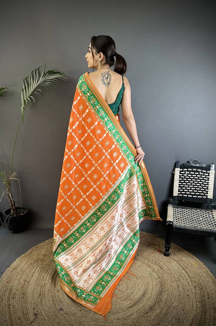 orange banarasi silk blend nature motifs zari weaving patola saree