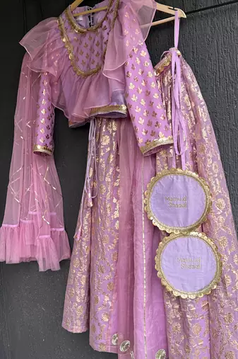 Purple embroidered organza lehenga set