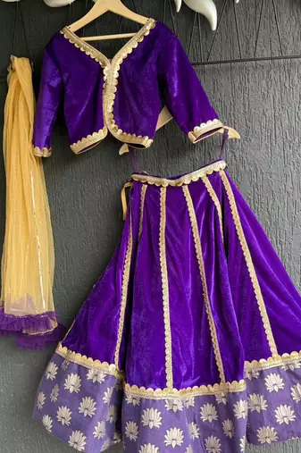 Purple embroidered velvet lehenga set