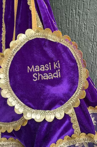 Purple embroidered velvet lehenga set