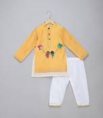 Yellow printed cotton silk kurta pyjama