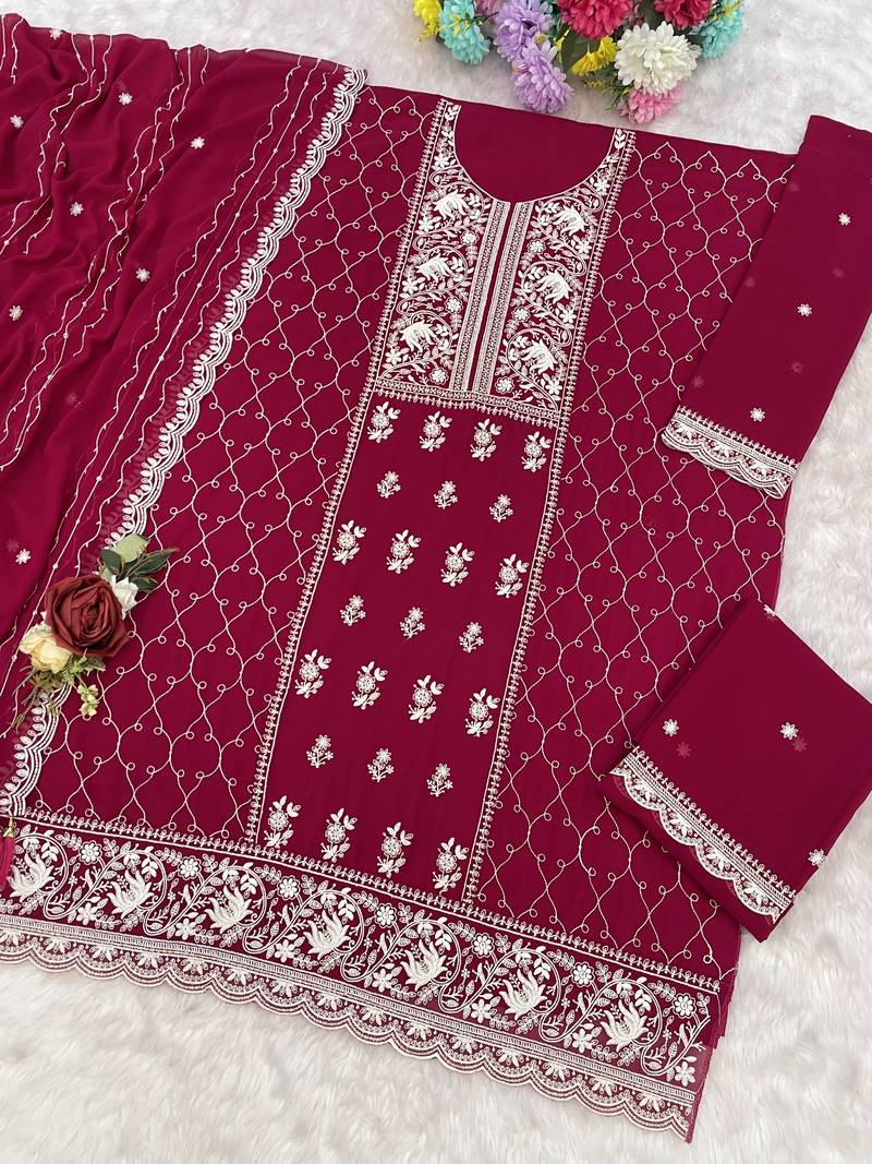 Rani pink embroidered georgette palazzo style salwar suit