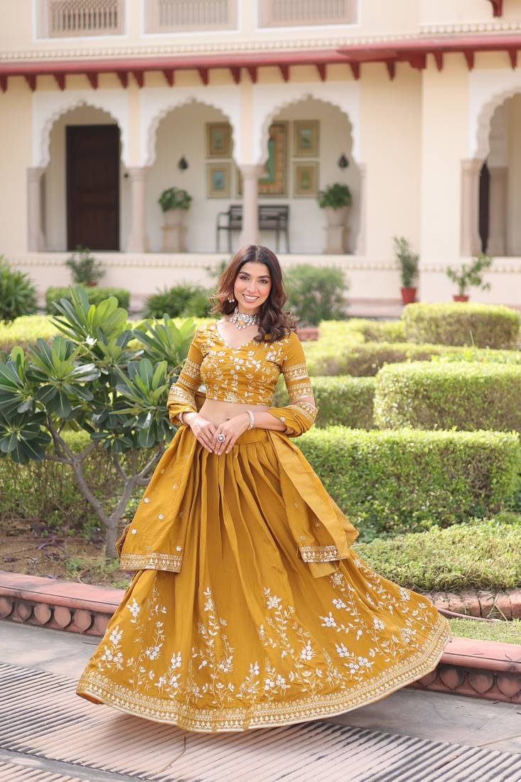 Yellow Silk Sequins Embroidered Lehenga Choli And Duptta