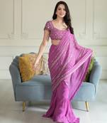 Magenta embroidered georgette saree