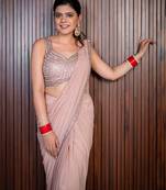 Pink embroidered lycra saree
