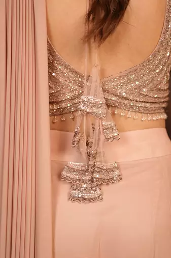 Pink embroidered lycra saree