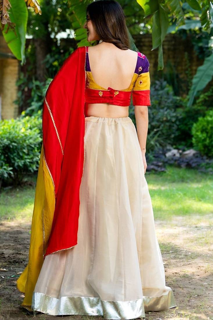 OFF WHITE SILK LACE LEHENGA AND MULTI-COLOUR BLOUSE AND DUPATTA