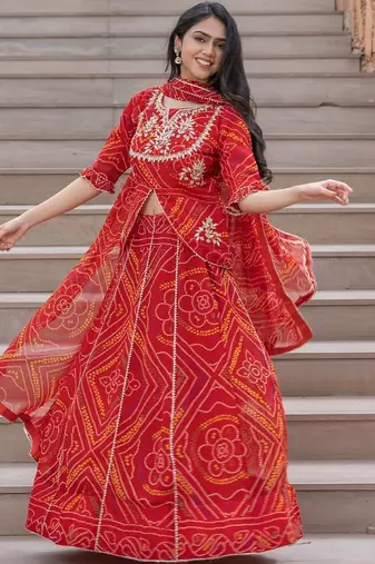 RED GRORGETTE HAND BHANDHINI LAEHENGA AND BLOUSE AND DUPATTA