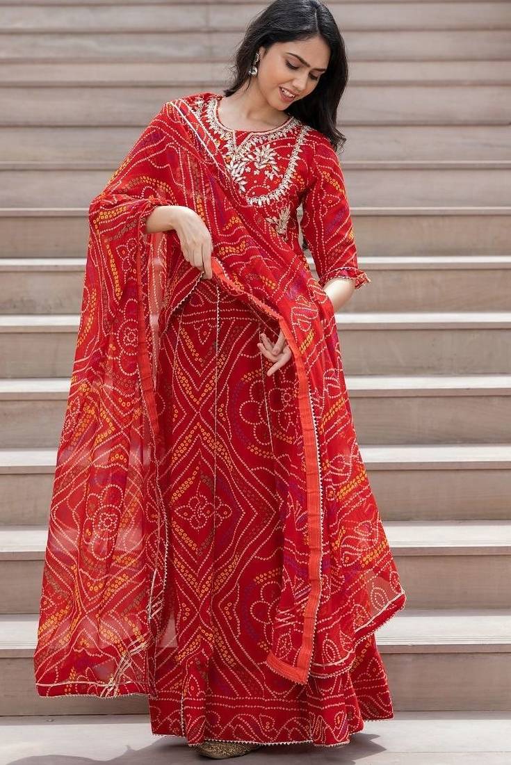 RED GRORGETTE HAND BHANDHINI LAEHENGA AND BLOUSE AND DUPATTA