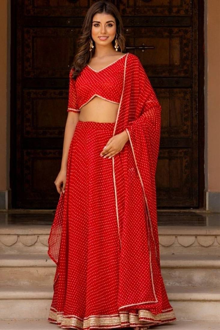 RED GRORGETTE LACE BHANDHINI LAEHENGA AND BLOUSE AND DUPATTA