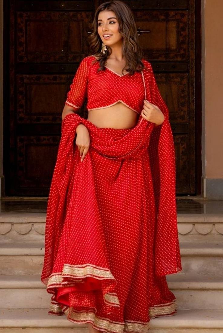 RED GRORGETTE LACE BHANDHINI LAEHENGA AND BLOUSE AND DUPATTA