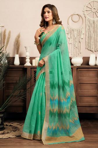 women teal green linen ikat saree