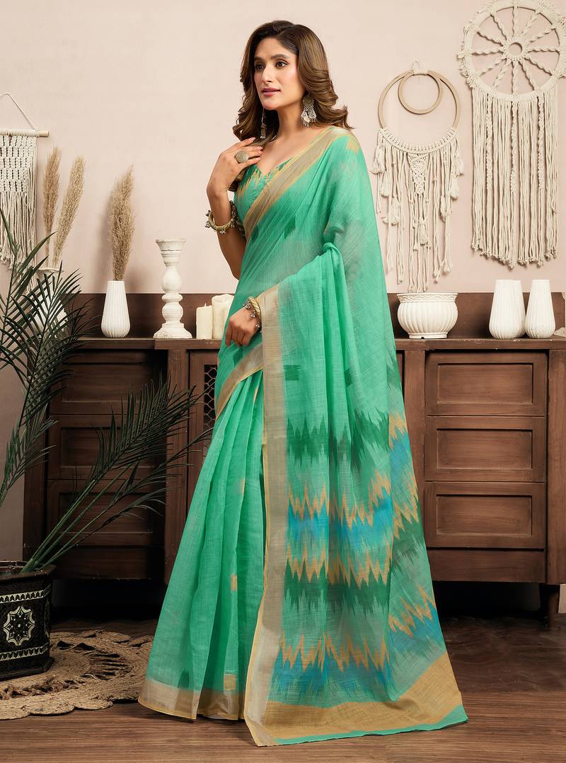 teal green linen ikat saree