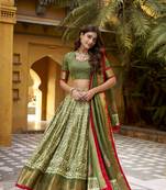 Green batik printed dola silk lehenga choli & dupatta