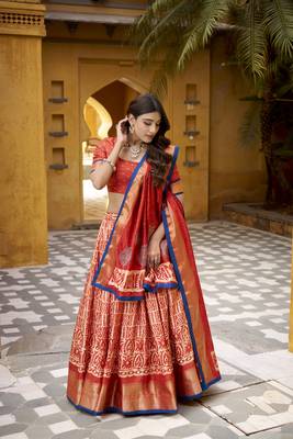 Orange Batik Printed Dola Silk Lehenga Choli & Dupatta 1