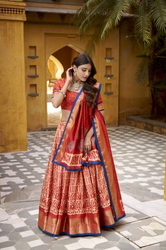 Orange Batik Printed Dola Silk Lehenga Choli & Dupatta