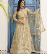Cream embroidered net Lehenga set with Choli and dupatta