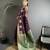 elora purple & green soft silk blend zari woven butti banarasi saree