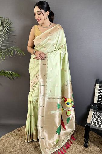 pista green soft silk blend peacock & floral zari motifs kanchipuram saree