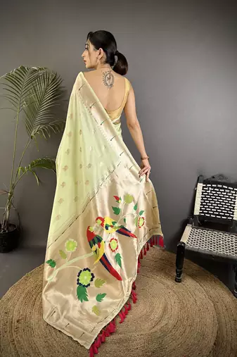 pista green soft silk blend peacock & floral zari motifs kanchipuram saree