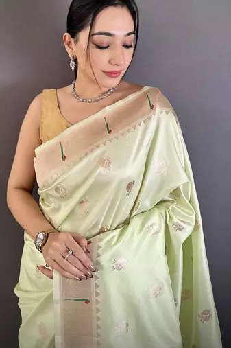 pista green soft silk blend peacock & floral zari motifs kanchipuram saree