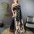 black soft silk blend peacock & floral zari motifs kanchipuram saree