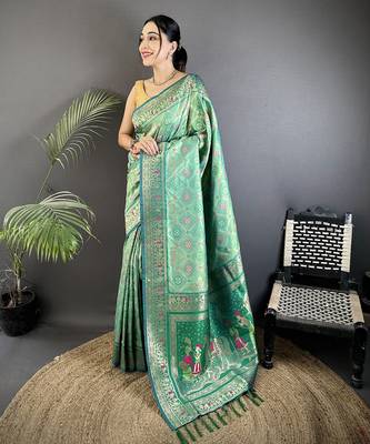 aqua green soft silk blend geomatric zari woven patola saree 1
