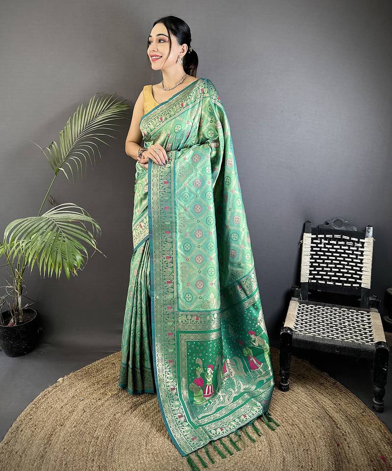aqua green soft silk blend geomatric zari woven patola saree