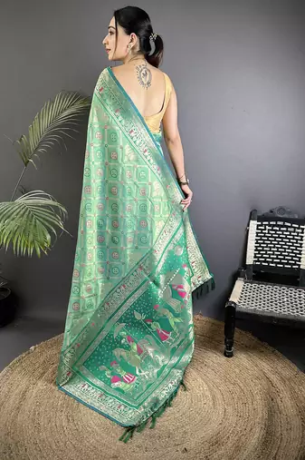 aqua green soft silk blend geomatric zari woven patola saree