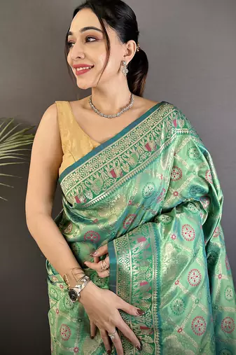 aqua green soft silk blend geomatric zari woven patola saree