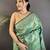 aqua green soft silk blend geomatric zari woven patola saree