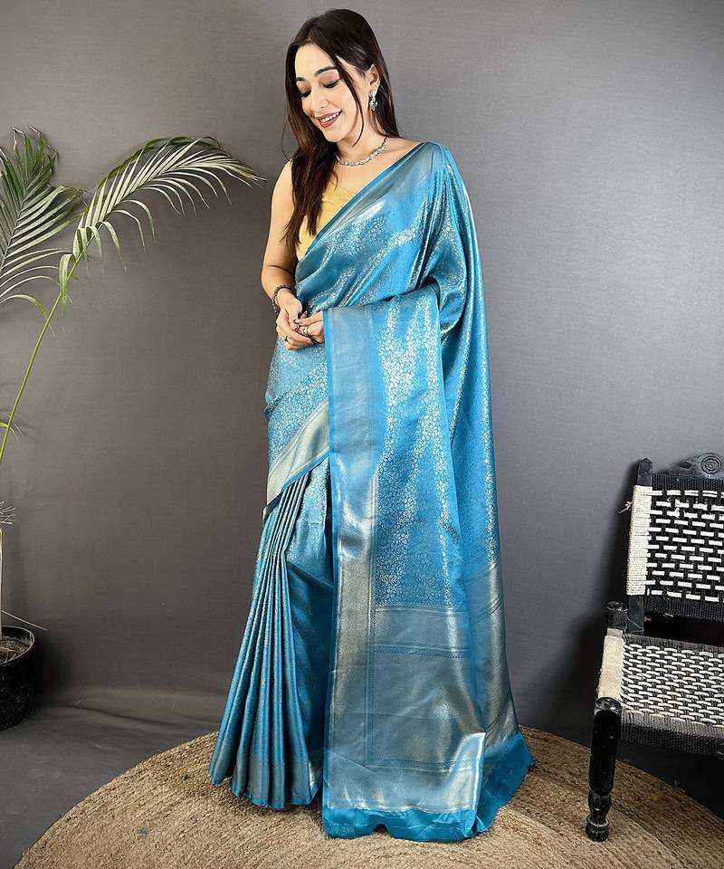 ocean blue satin silk blend floral motifs & ethnic silver zari design kanchipuram saree
